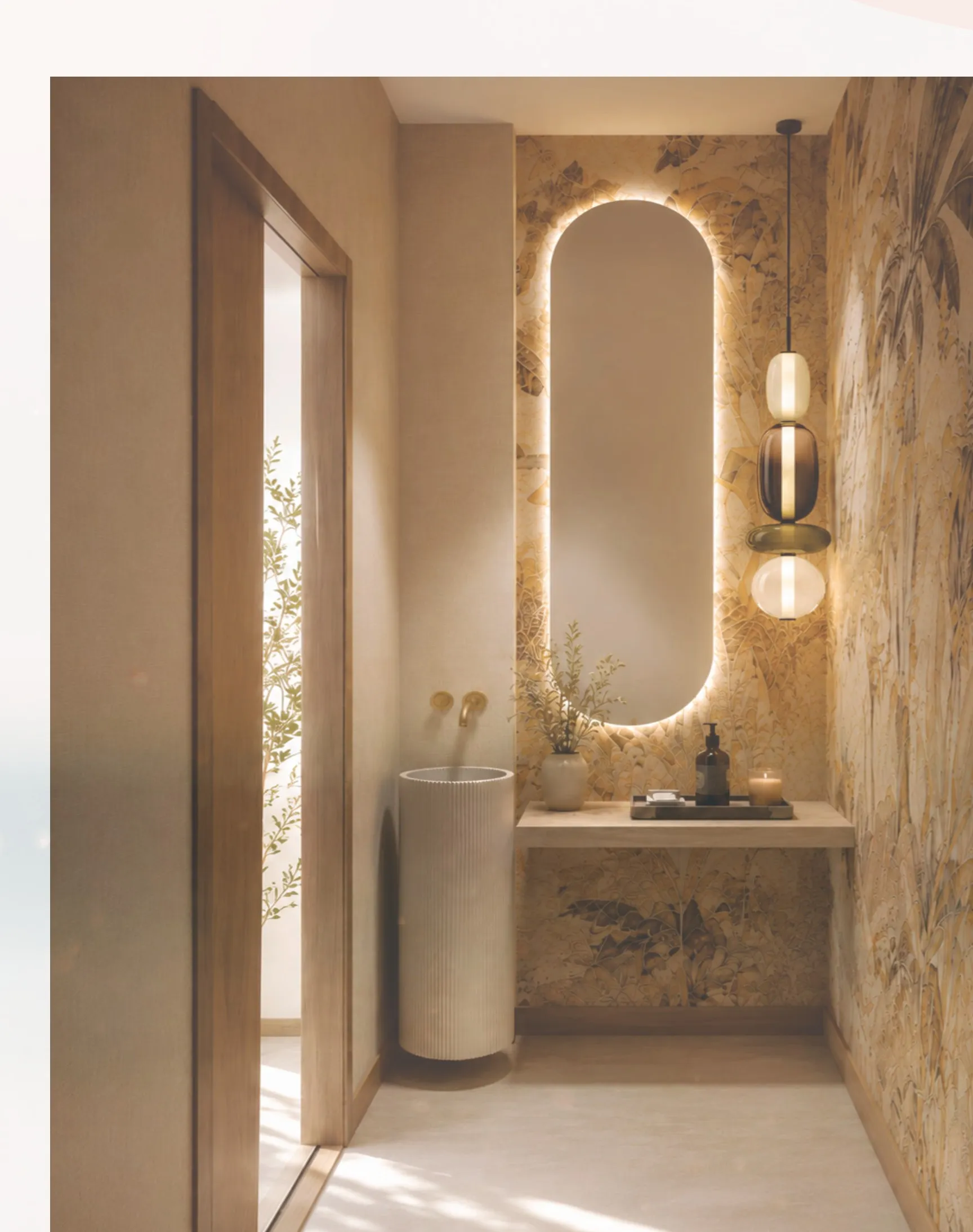 Powder room — banana-leaf mural, backlit oval mirror, fluted stone basin